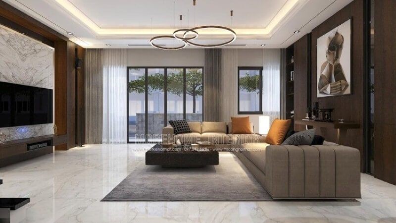 Với không gian rộng lớn, việc thế kế đòi hỏi phải làm sao để nó mang lại cảm giác gần gũi, Morehome xin gợi ý ý tưởng trong bố trí nội thất biệt thự Park city trong đây, phòng khách với tone màu trầm kết hợp cách trang trí khéo léo từ tấm gỗ ốp tường, tranh canvas, sofa góc, đá đối vân trang trí.